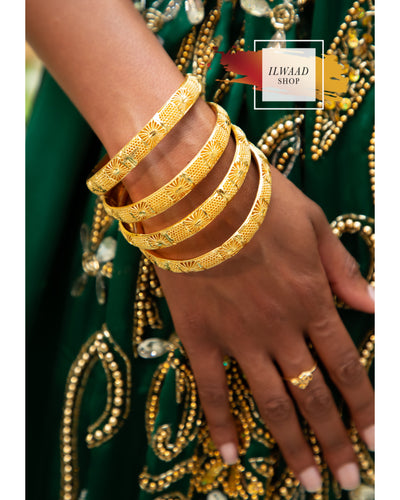 4 piece golden bangles